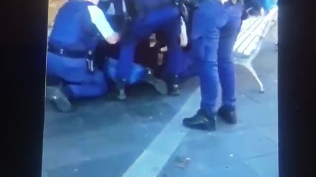 14 AUSTRALIAN POLICE ASSAULT WOMAN ATTENDING SILENT VIGIL