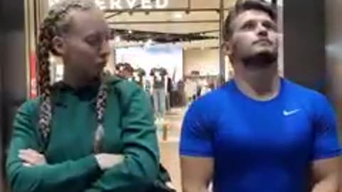 Prank: Man shows his pecks and they both have fun with the scene