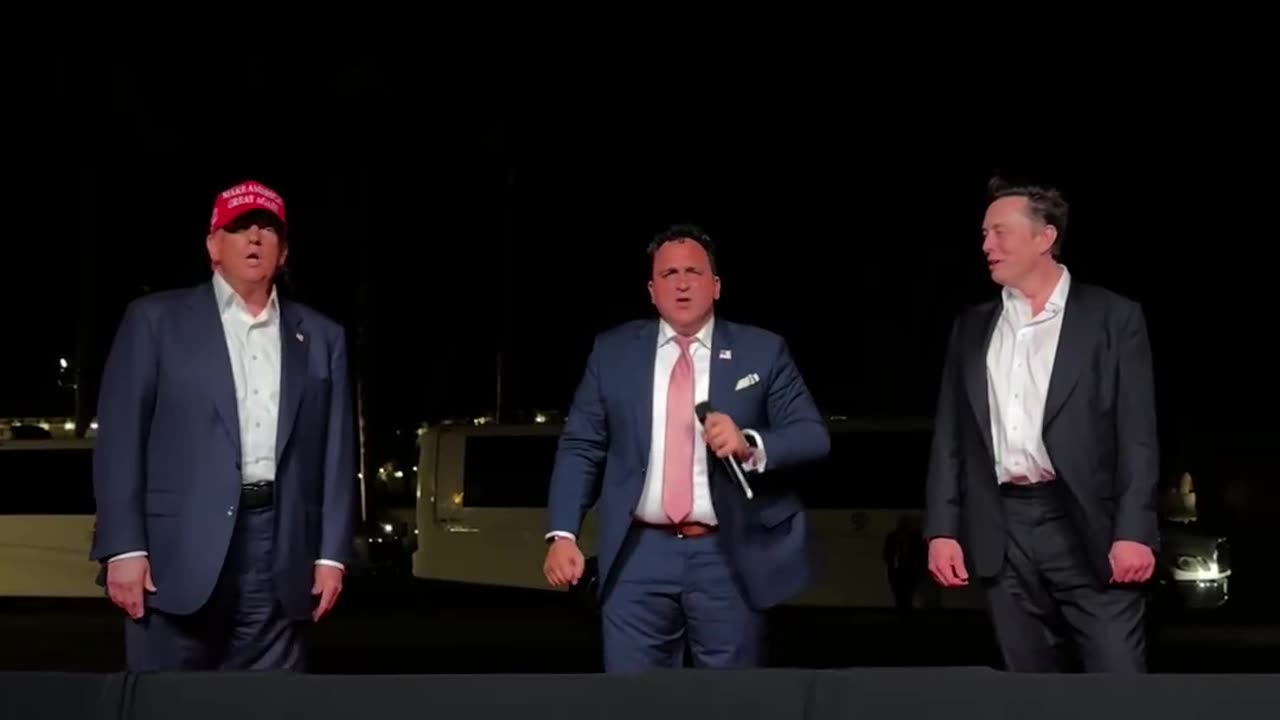 President Donald Trump and Elon Musk join Chris Macchio in singing God Bless