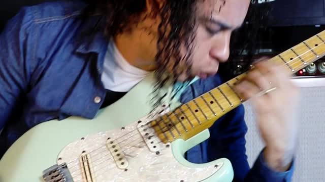 He played the guitar by blowing the strings with his mouth!