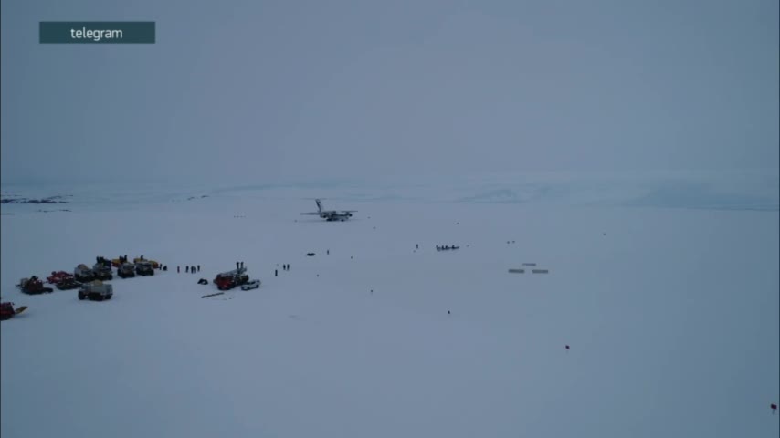 Landing of a heavy transport IL-76 on snow and ice in Antarctica near Progress station.