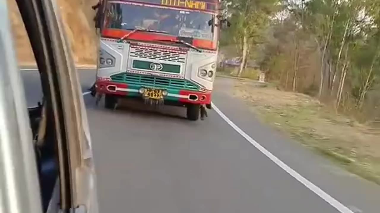 India (himachal pradesh) transport bus driving on hills