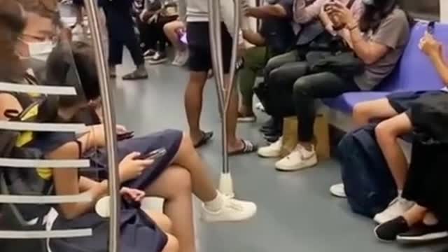 Man shouts in MRT saying he has god's message, passenger up & leaves