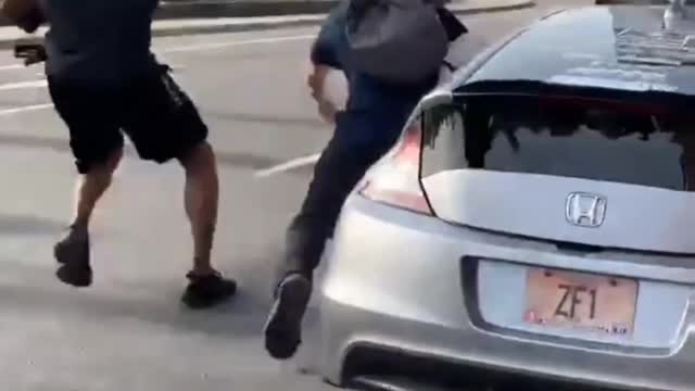Classic: Antifa and BLM standing in front of cars