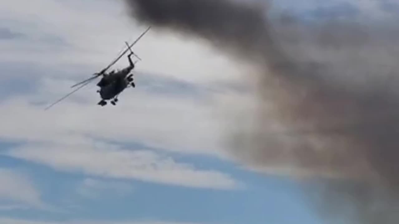 Ukrainian Attack Helicopters Flying Low and Firing Rockets Overhead