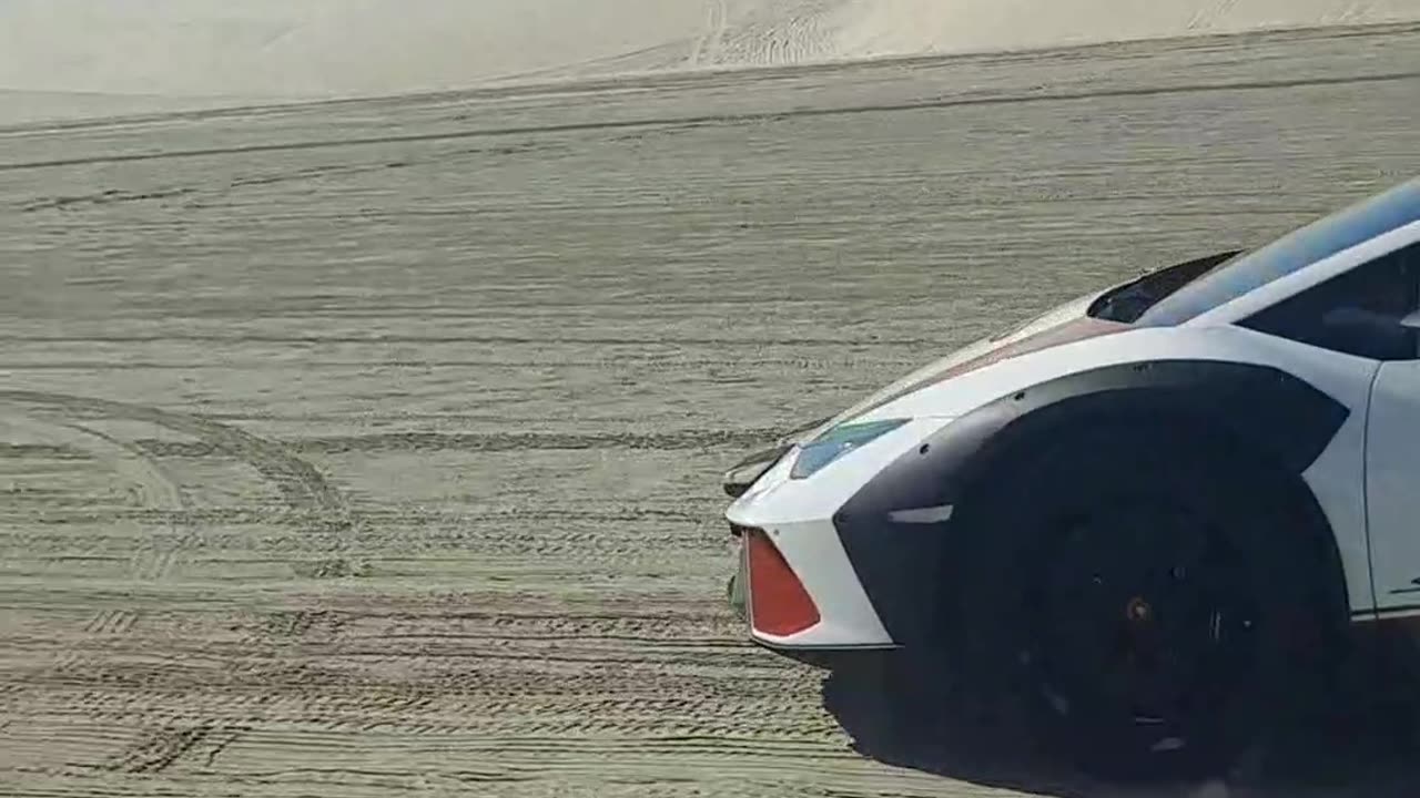 Sports car in the sand
