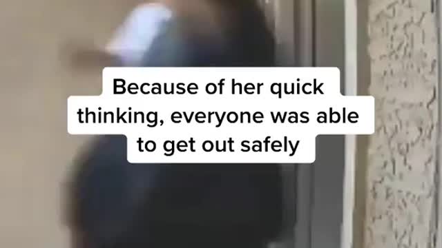 This woman saw that her neighbor's house was on fire at 7:30 a.m.