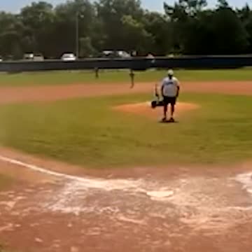 A dust devil strikes during a children's baseball game in Jacksonville