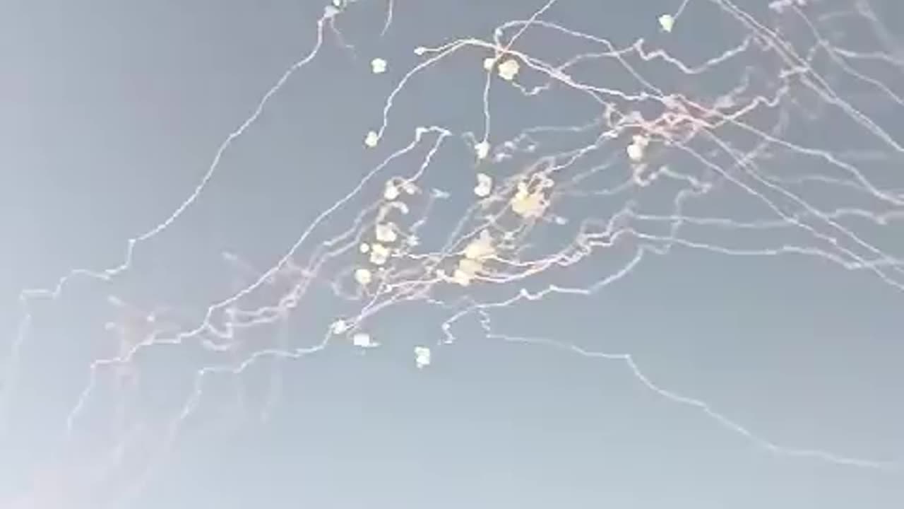 Footage shows the Iron Dome engaging a massive Hezbollah rocket barrage