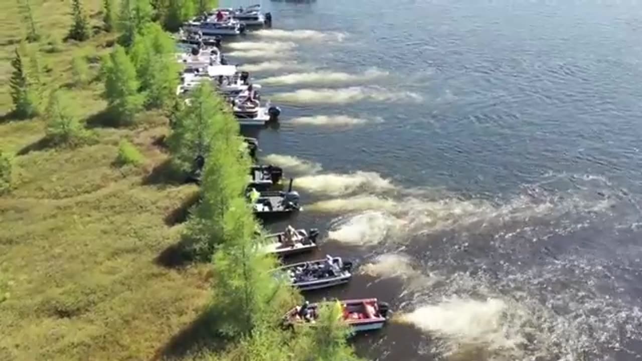 Island being pushed by boats