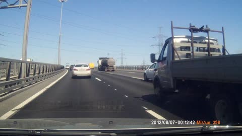 Semi Takes Out Car On Russian Highway