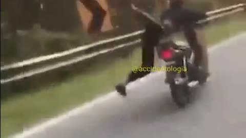 Wheelie Man Becomes One With The Guard Rail