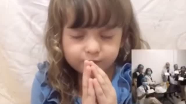 A 3 Year Old Little Girl Praying for the World.