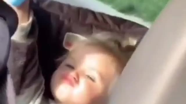 Funny reaction of a cute kid when he sees the camera