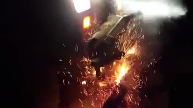 Running jeep car over bonfire