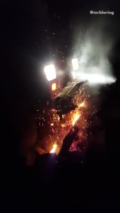 Running jeep car over bonfire