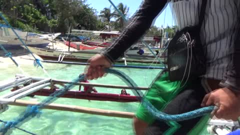 Filipino children jumping on ships