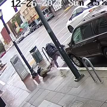 A man robs an Asian couple in San Francisco and then makes a getaway in a waiting Mercedes SUV