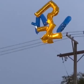 Balloons hitting powerlines