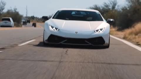 White Lamborghini. I love the sound when it shifts gears