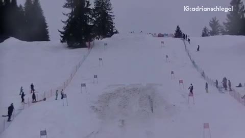 All white skiing guy attempts flip ramp falls on head crowd