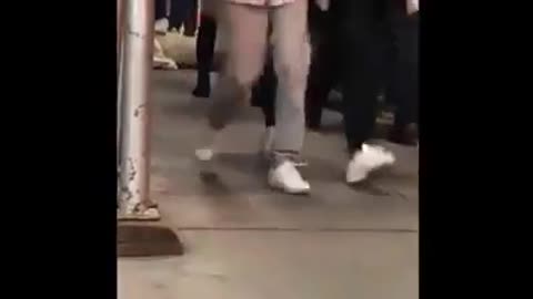 Public trample man in road carpet