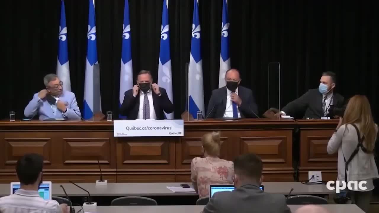 Watch how Quebec's communist Premier Legault throws the 666 sign