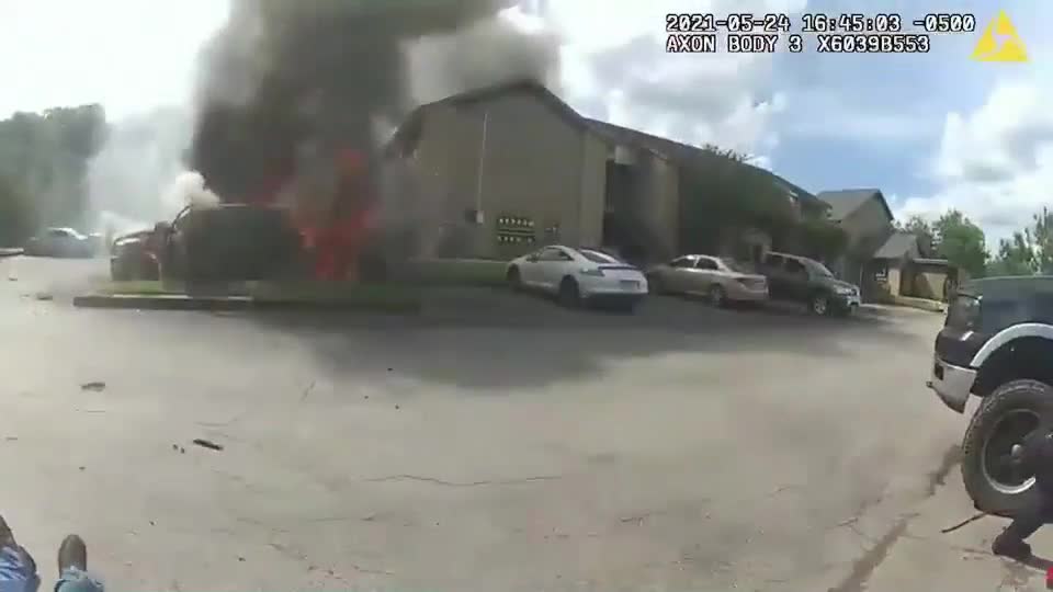 CCTV Video Footage shows Police Officer Save Man from Car on Fire