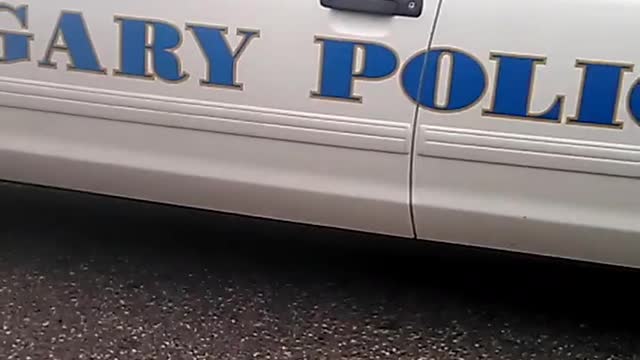 Policeman Sleeping in His Car