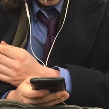 Guy has snot dripping out of his nose on subway