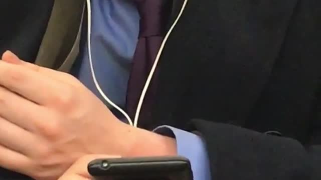 Guy has snot dripping out of his nose on subway