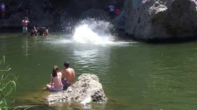 Red trunks backflip dive fail