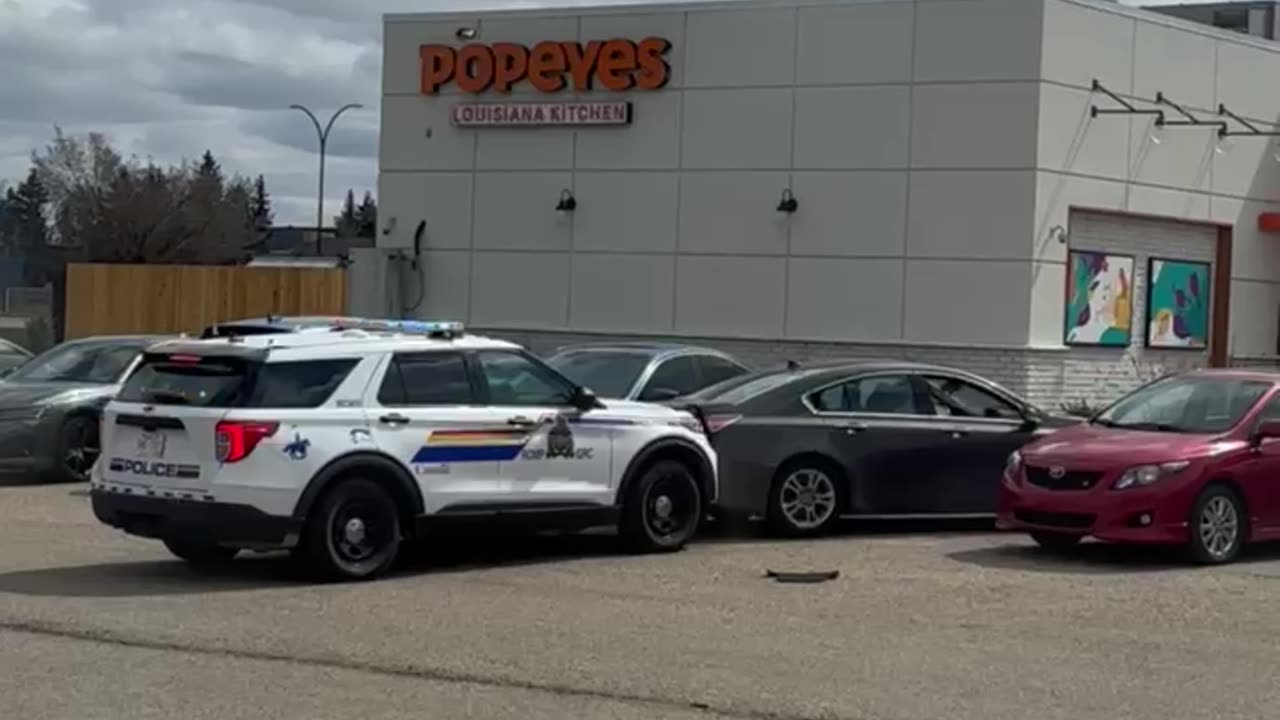 Police Blockade Alleged Car Thief In Parking Lot