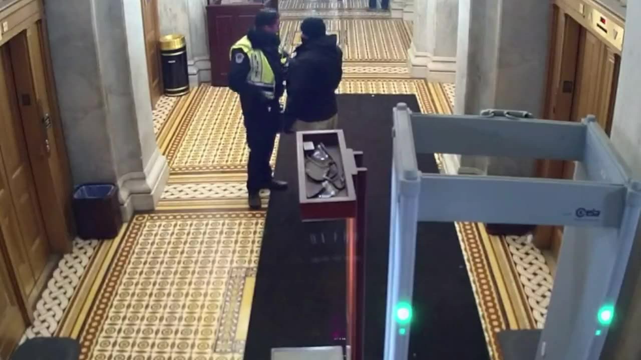 Footage Shows Capitol Officers Uncuffing January 6 Protester, Giving Fist Bump Before Releasing Him