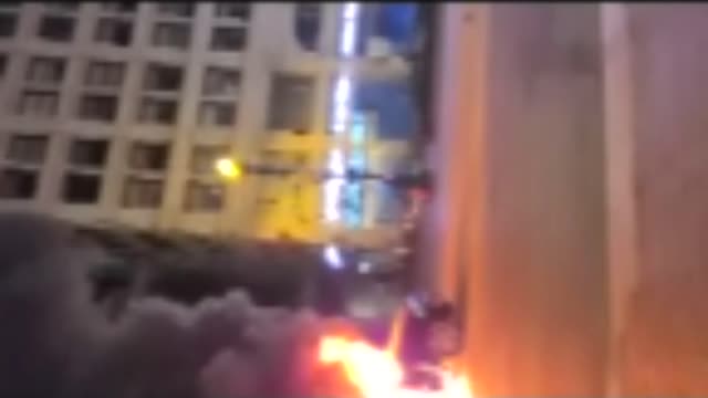BLACK MAN HIJACKS A CAR IN CHICAGO AND BURNS IT DOWN.
