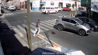 Pedestrian Falls Flat on His Face at Crosswalk