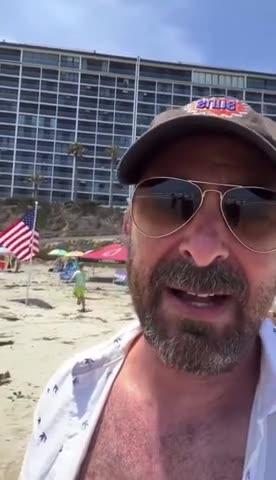 Leftist Freaks Out Seeing American Flags On Beach