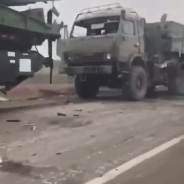 Russia attacks Ukraine - near Kherson, russian APC and "Kamaz"