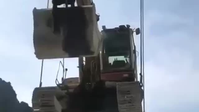 Flying excavator at a dam project 😎😍