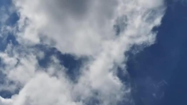 Blue sky as the clouds travel blown by the wind