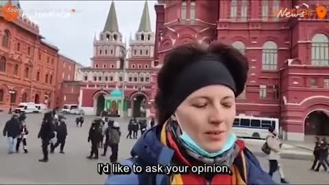 A disturbing video shows a Russian anti-war protester being bundled away by poli