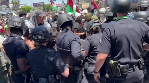 Pro-Palestine protesters block the entrance to a synagogue in Los Angeles