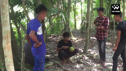 Funny video about small brothers and friends of the village eating sour fruits from junjle