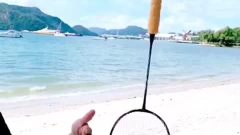 Badminton racket finger spin