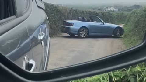 Car Does 15-Point-Turn on Country Lane