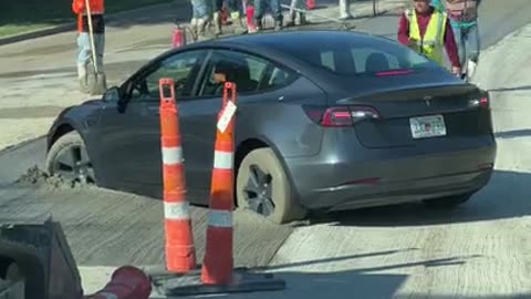 Tesla Stuck in Wet Cement