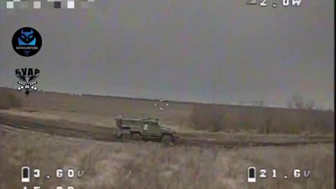 Ukrainian Drone Smashes into Russian APC