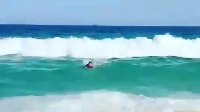 Learn how to surf giant waves