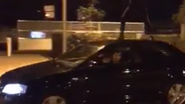 Black moving car night time dancing back flip face hits car fail