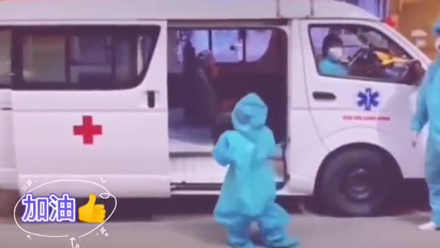 4 years old girl with hazmat suit being sent off to a Covid quarantine camp alone